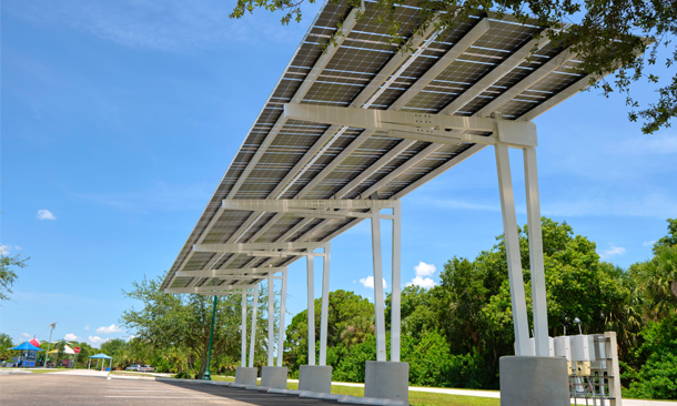Solar carport installation in Hyderabad, providing shaded parking and renewable solar power for homes and offices.